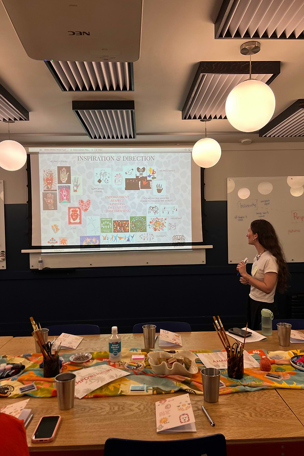 our staff speaking to young leaders about the brand
