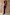 Thumbnail for Chocolate Sabine Dress, a brown maxi with a draped cowl halter neckline, worn by a model against a stone wall.