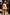 Thumbnail for Girl wearing a multicoloured banana print cotton co-ord set with a sleeveless peplum top and flared trousers.