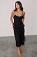 caption_Model wears Black Molly Dress  in UK size 8/ US 4