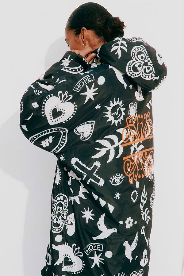 caption_Model wears Hope Charcoal Changing Robe  in size M