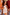 Thumbnail for Girl wearing a cream cotton vest with a sequined soleil sun motif and yellow sun print trousers.