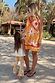 Girl wearing the Yellow Sun Cotton Set with flared trousers and iconic soleil motifs in an outdoor setting.