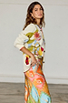 caption_Model wears Multi Enchanted Cardigan in size M