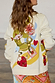 caption_Model wears Multi Enchanted Cardigan in size M