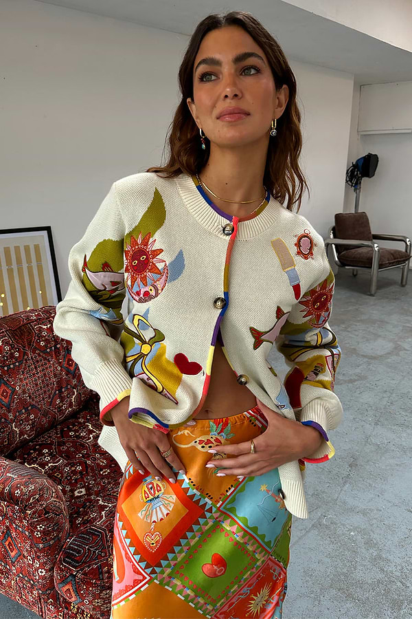 caption_Model wears Multi Enchanted Cardigan in size M