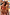 Thumbnail for Girl's Yellow Sun Swimsuit with frill trim and sun print worn during a beach vacation.