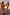 Thumbnail for Girl's yellow sun-printed swimsuit with frill detailing on a beach vacation with a matching adult bikini.