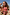 Thumbnail for Pink Fruit Crop Bikini Set featuring Mediterranean-inspired prints and a shirred top on a sunny beach.