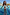 Thumbnail for Blue Starburst Crop Bikini Set with smocked bandeau top and frill trims on a smiling girl in a sunny pool.