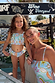 Blue Starburst smocked bikini set for girls with frill trims and playful motifs, worn on a sunny vacation.