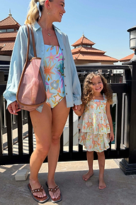 Girl's Starburst Skirt Co-ord Set in blue cotton with tiered skirt and peplum top featuring star and sun motifs.