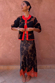 Tan Jaden Floral Jacquard Cardigan with red trim styled with matching floral lace hem skirt
