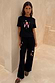 Thumbnail for caption_Model is 5ft4” and wears size M