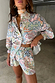 caption_Model wears White Magnolia Elissa Shorts in UK size 10/ US 6