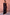 Thumbnail for Model wearing Mesh Dress in Tan Jaden Floral Print standing against a pink textured wall