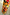 Thumbnail for Rio A-Symmetric Skirt in a bold tropical fruit print jersey with oversized papaya and dragon fruit motifs.