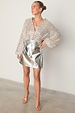 caption_Model wears Silver Sequin Miley Shirt in UK size 10/ US 6