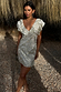 caption_Model wears Cream Jacquard Tilda Mini Dress in UK size 10/ US 6