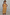 Thumbnail for Young girl wearing a yellow cotton maxi sun dress with white sunburst prints and a shirred top.