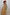 Thumbnail for Girl wearing a yellow cotton sun dress with white sun print and shirred top.