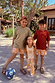 Boys wearing Yellow Sun Swim Shorts and t-shirts in a beach vacation setting.