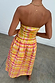 Yellow, pink and orange Check Lola Mid-axi Dress with a ruched bodice shown from the back.