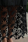 Model wearing Black Star Sasha Dress standing facing the camera