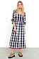 Model wearing Gingham Macy Midi Dress standing facing the camera 