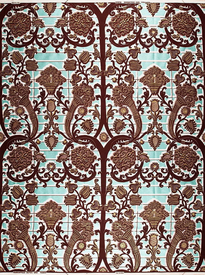 Fabric features ornate symmetrical pattern wax glitterglam