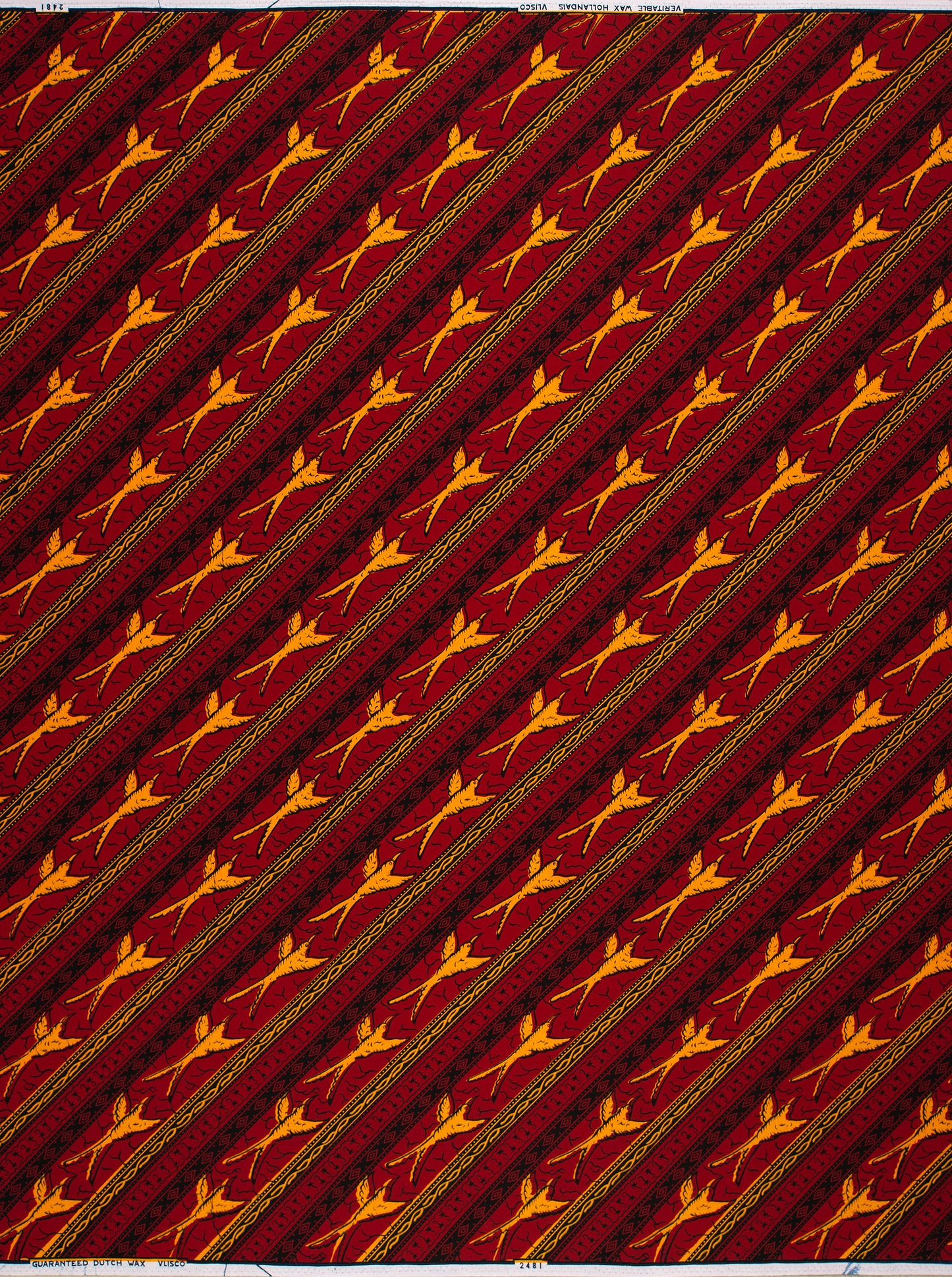 Rich crimson fabric diagonal stripes wax hollandais vl02481.056