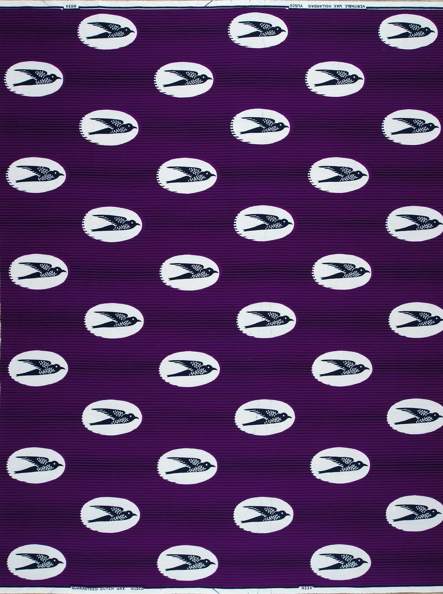 Purple fabric pattern white circles wax hollandais vl0h524.225