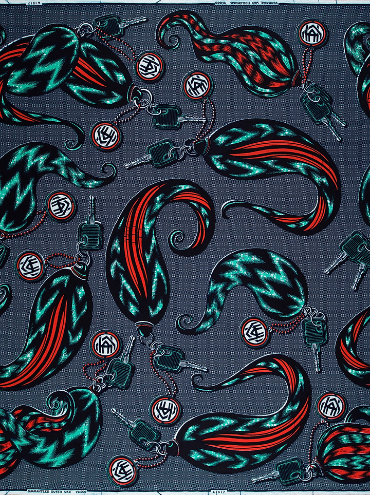 Vibrant teal red paisley-patterned fabric wax hollandais vla1517.049