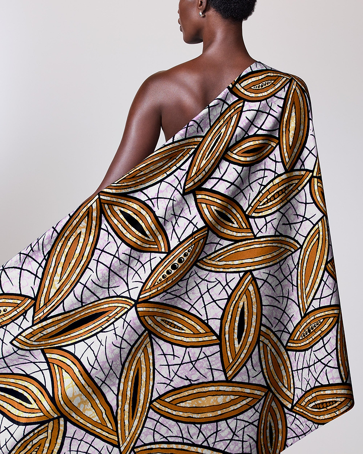 Woman wears one-shoulder wrap dress super-wax vls1884.009