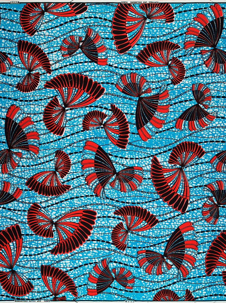 Vibrant red black fan-shaped motifs wax hollandais vlw5154.002