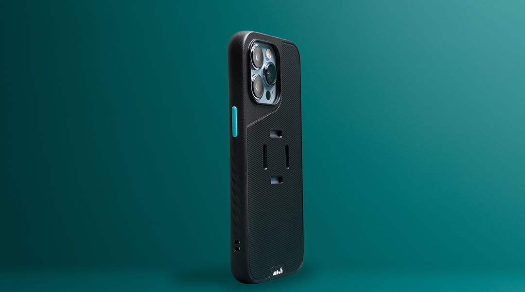 Mous Evolution iPhone case at an angle on a dark teal background
