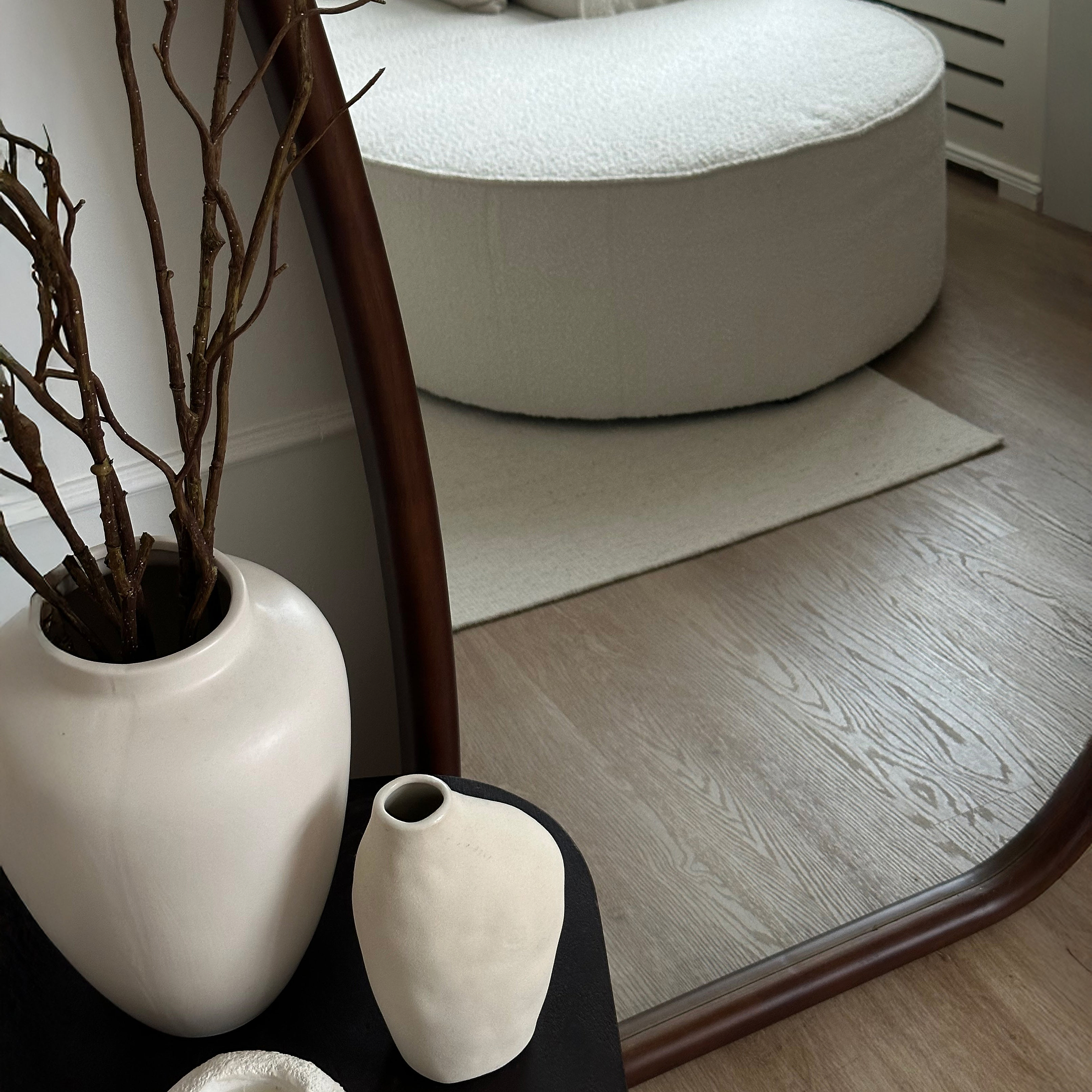 Full Length Arched mirror leaning against a wall