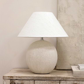 Stone ceramic coolie shade table lamp on console table