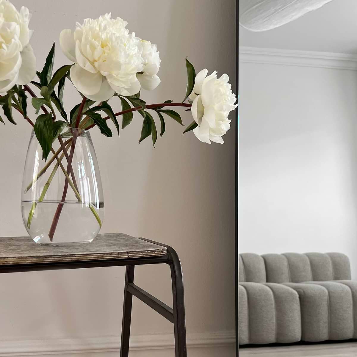 Extra large frameless arched full length mirror with vase