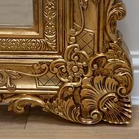 Gold Ornate Floor Mirror detail shot of bottom corner intricate design