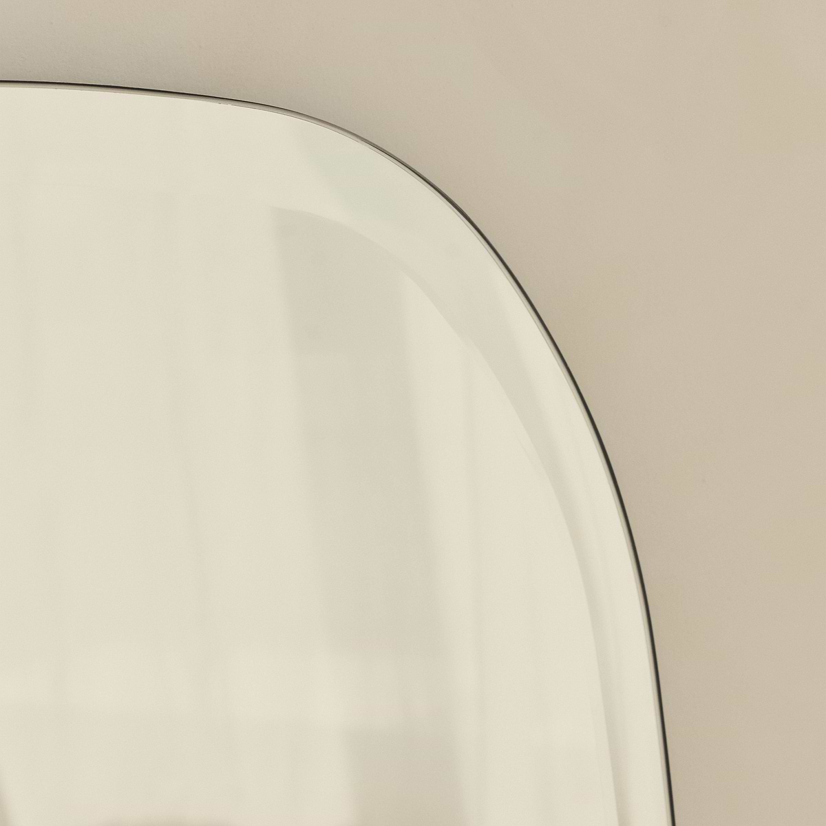 Vienna - Large Frameless Curved Bevelled Mirror 100cm x 65cm