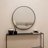 Black Metal Industrial Round Wall Mirror above console table