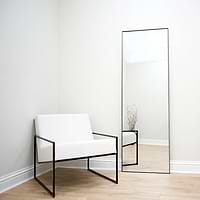 Full Length Black Rectangular Large Metal Mirror beside chair