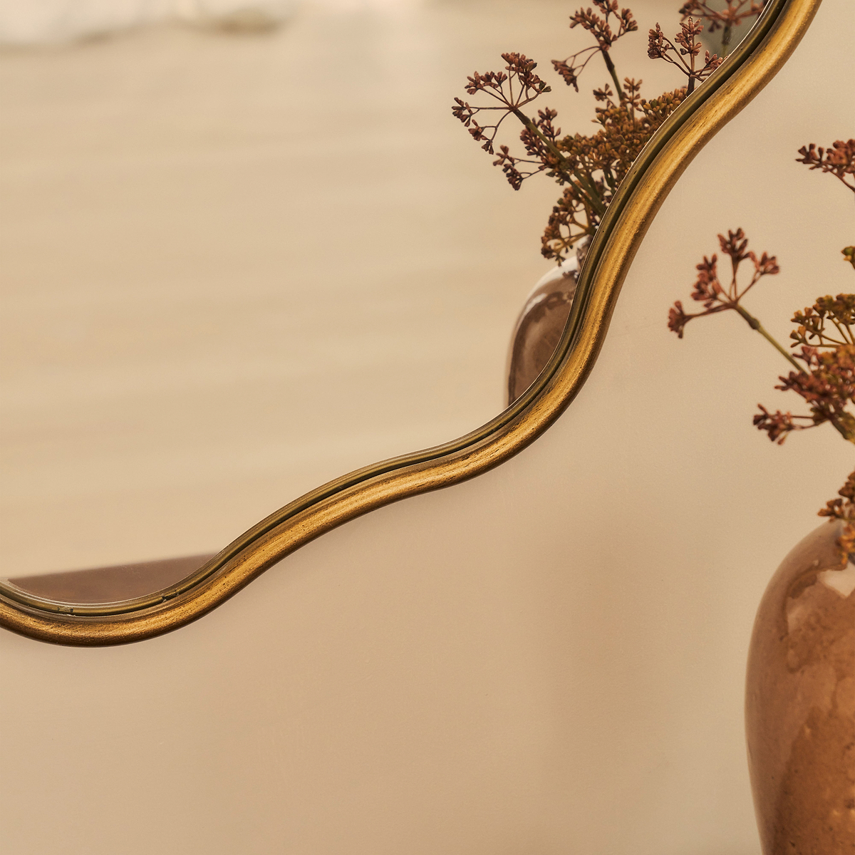 Sabrina - Gold Wavy Oval Metal Wall Mirror 100cm x 70cm