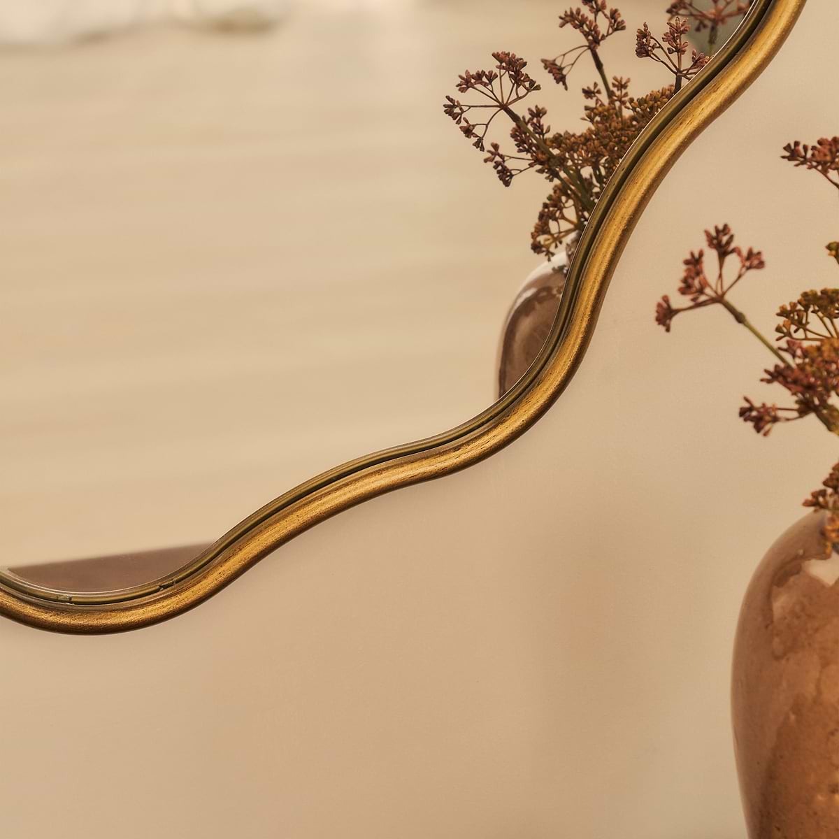 Sabrina - Gold Wavy Oval Metal Wall Mirror 100cm x 70cm