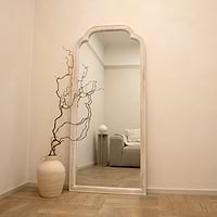 Full Length White Washed Wood Arched Mirror in mood lighting