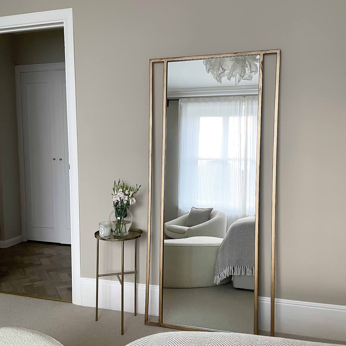 Full Length Gold Metal Mirror in lounge