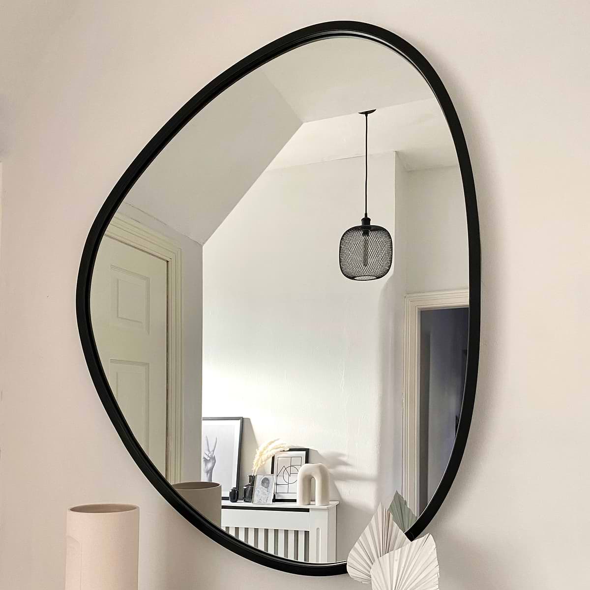 Large Black Irregular Metal Wall Mirror in living room
