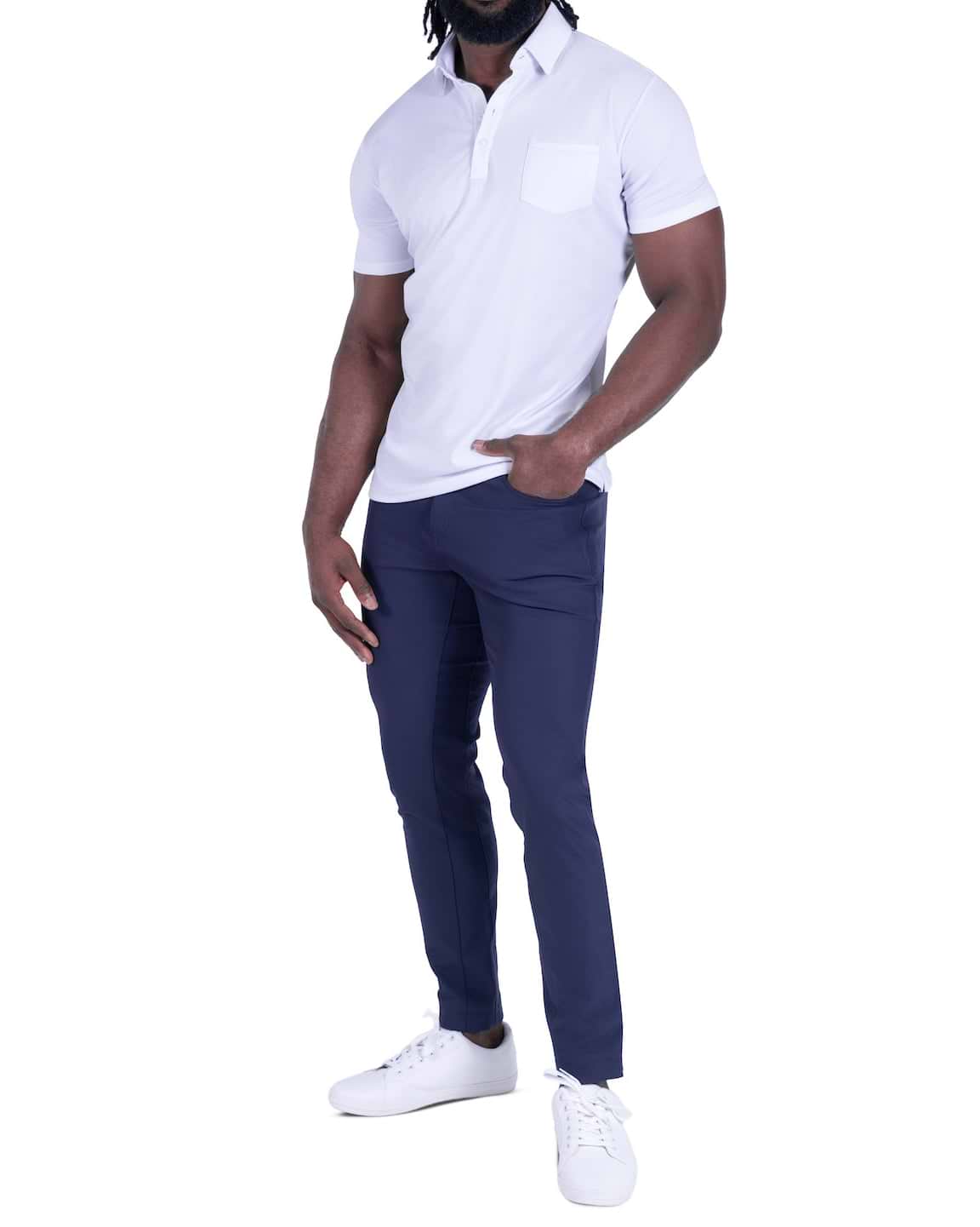 Person wearing a white polo shirt and navy pants on a white background