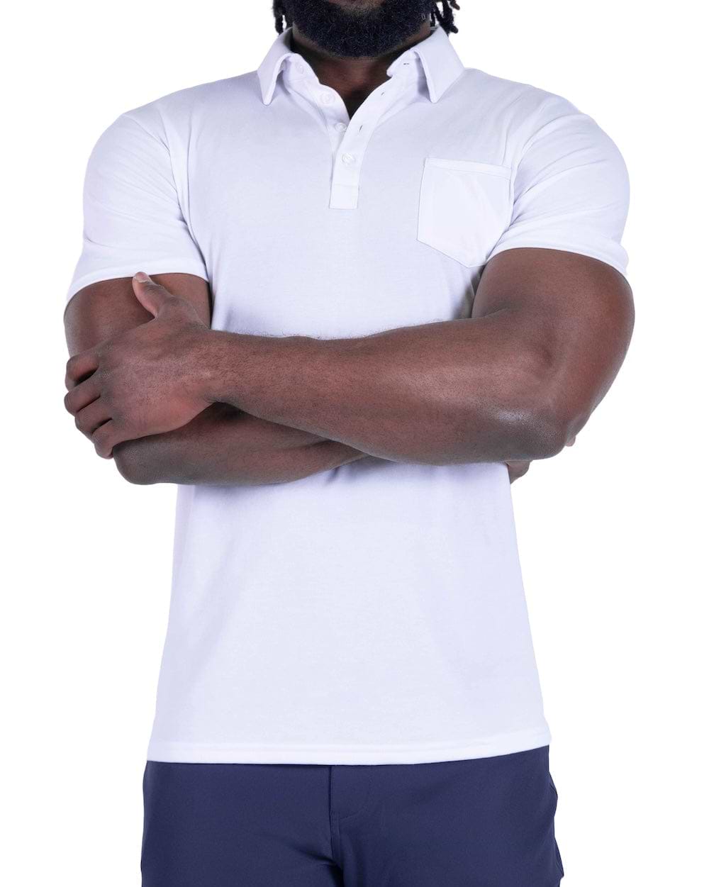 Person wearing a white polo shirt with arms crossed on a white background